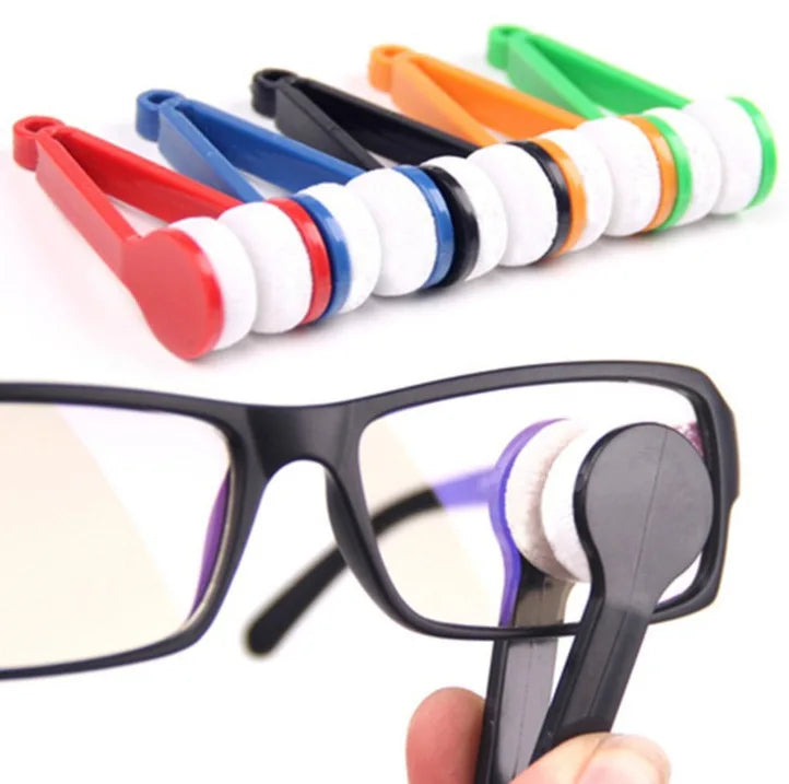 Colorful eyeglass retainers on a white background with a black-framed glasses held by a hand.