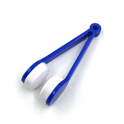 Pair of blue tongs with white ends on a white background