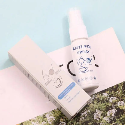 Anti-fog spray bottle with packaging on a light blue background